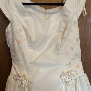 Elegant White Floral Dress. It does have a Wedding train too